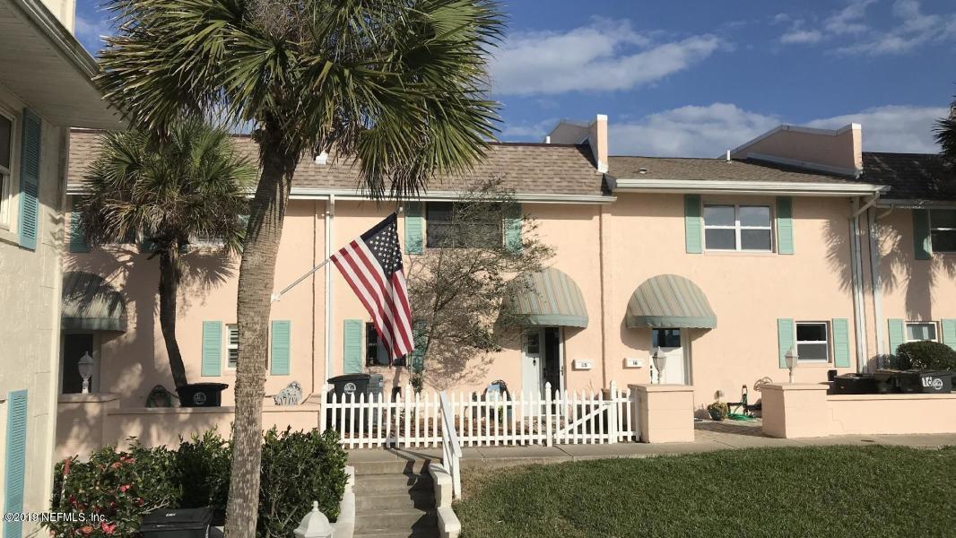 2233 Seminole Road, Unit 15 Atlantic Beach, FL 32233 - Photo 35 of 48 a view of a house with a yard and potted plants