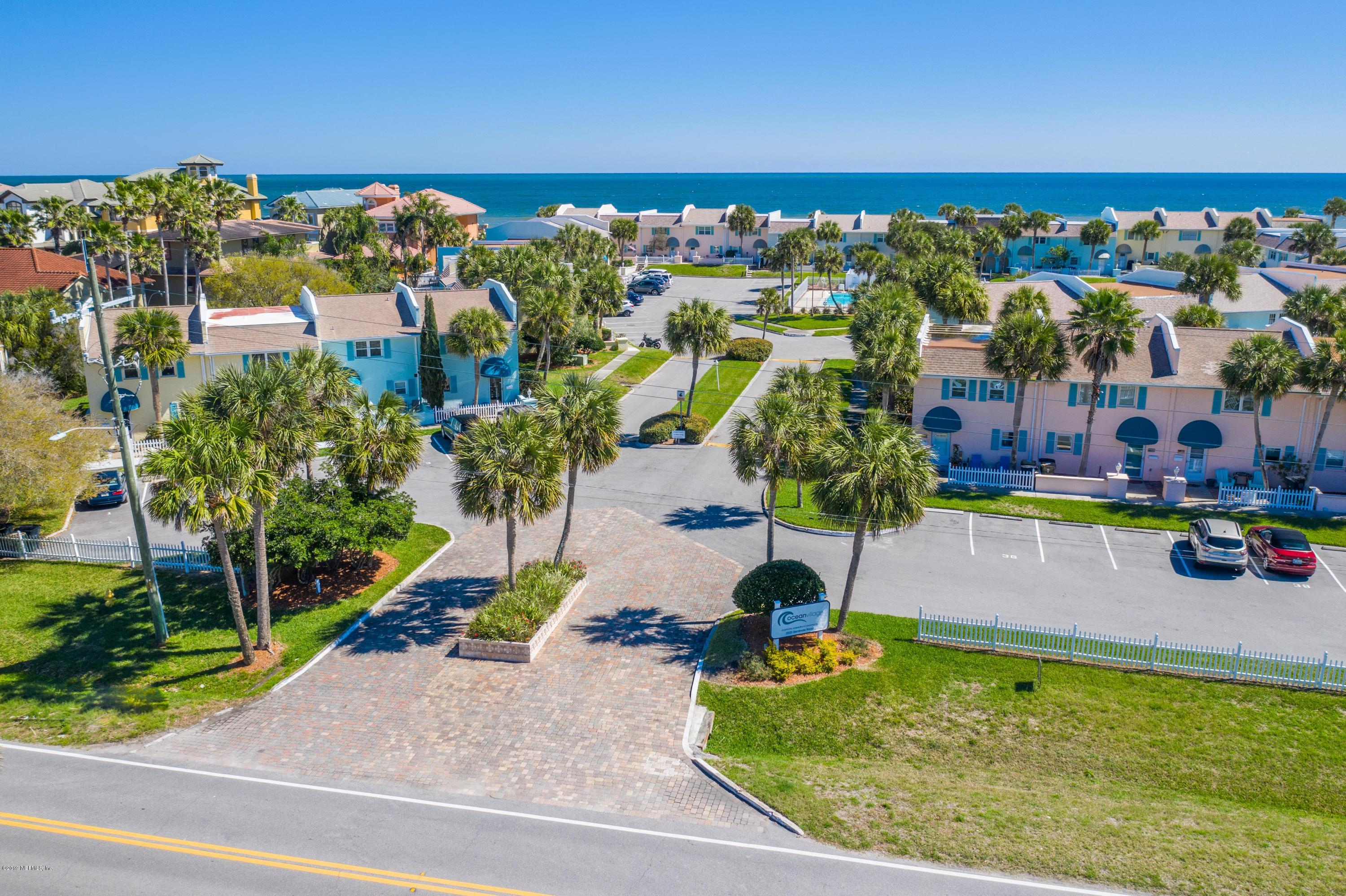 2233 Seminole Road, Unit 15 Atlantic Beach, FL 32233 - Photo 45 of 48 an aerial view of a house with a swimming pool yard and outdoor seating