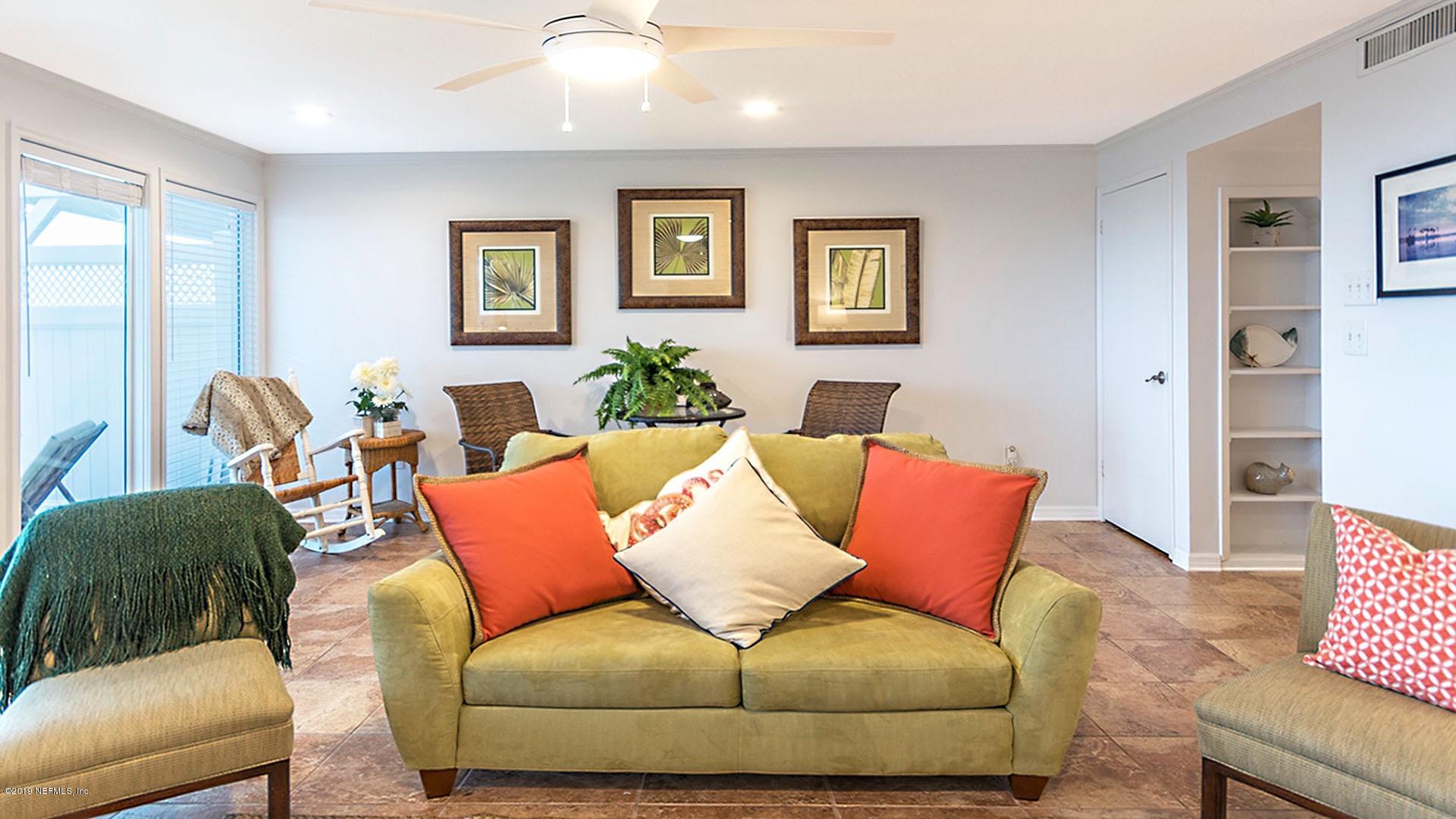 2233 Seminole Road, Unit 15 Atlantic Beach, FL 32233 - Photo 10 of 48 a living room with furniture and a couch