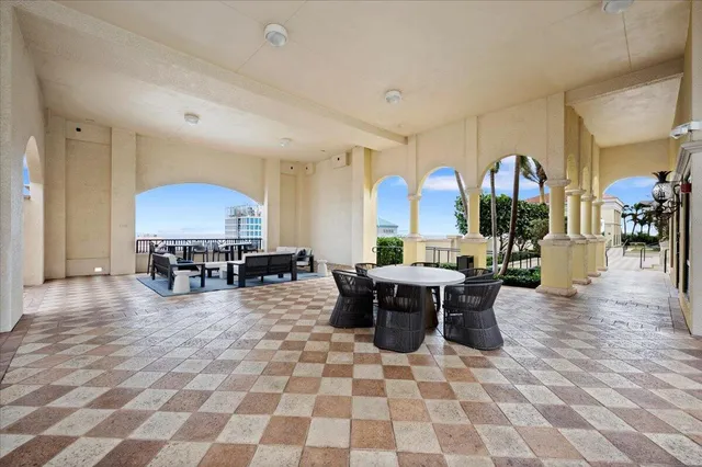 a view of swimming pool from a balcony