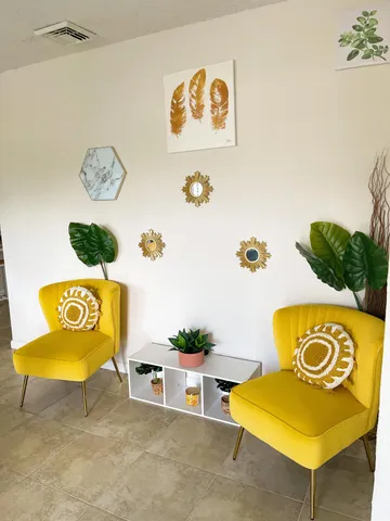 a kitchen with a sink a refrigerator and washer