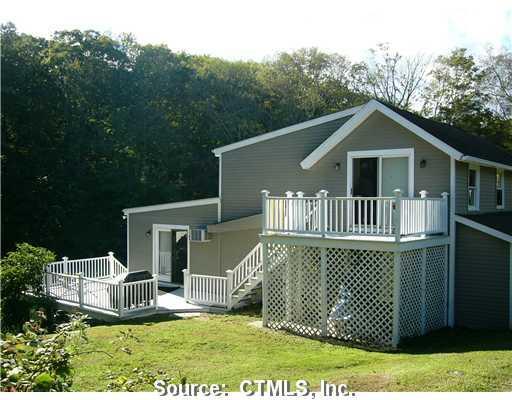 42 Bokum Road Chester, CT 06412 - Photo 1 of 1 a view of a house with a yard deck and a garden