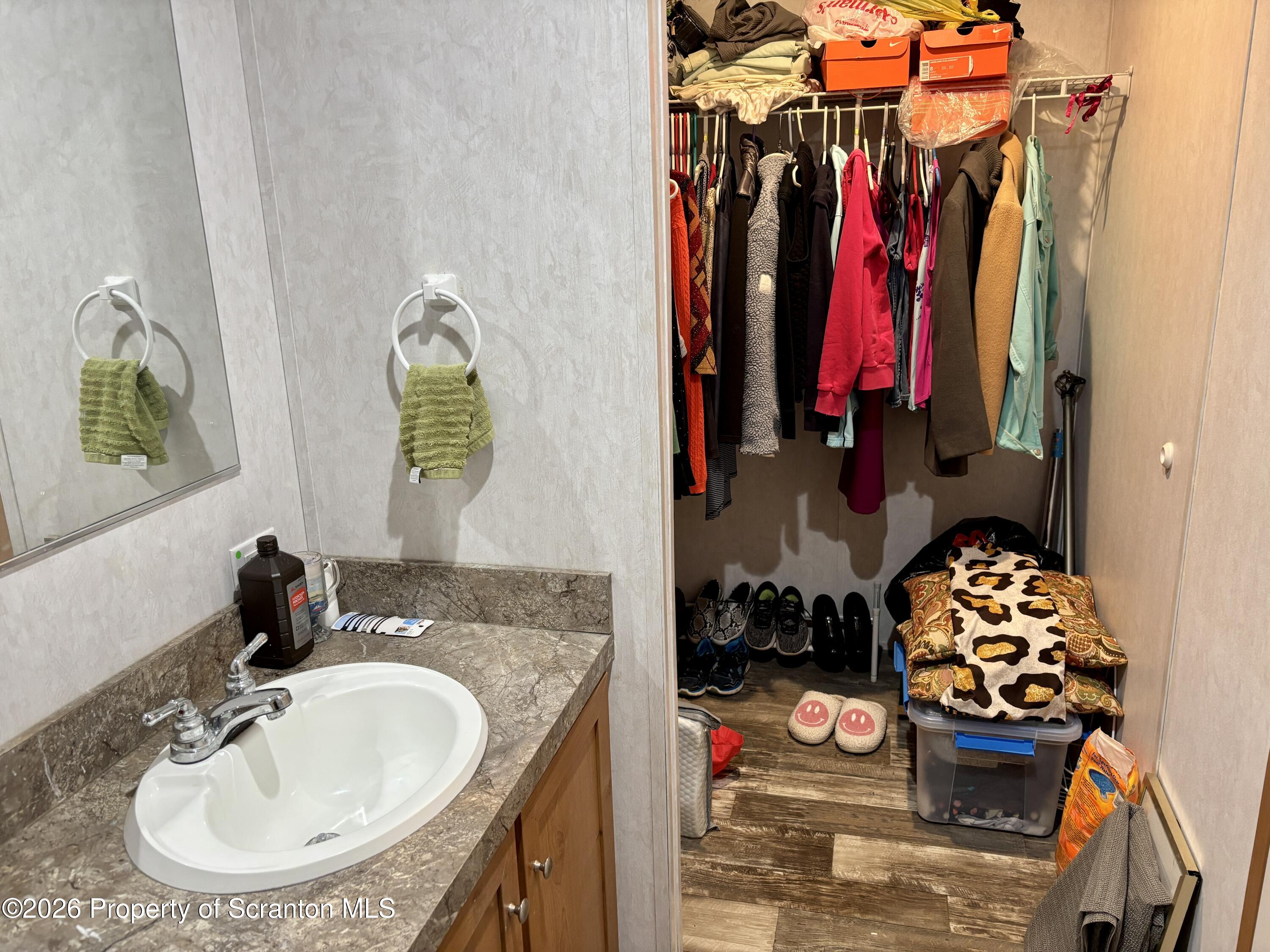 62 Timber Trail Factoryville, PA 18419 - Photo 12 of 23 a bathroom with a sink and a mirror