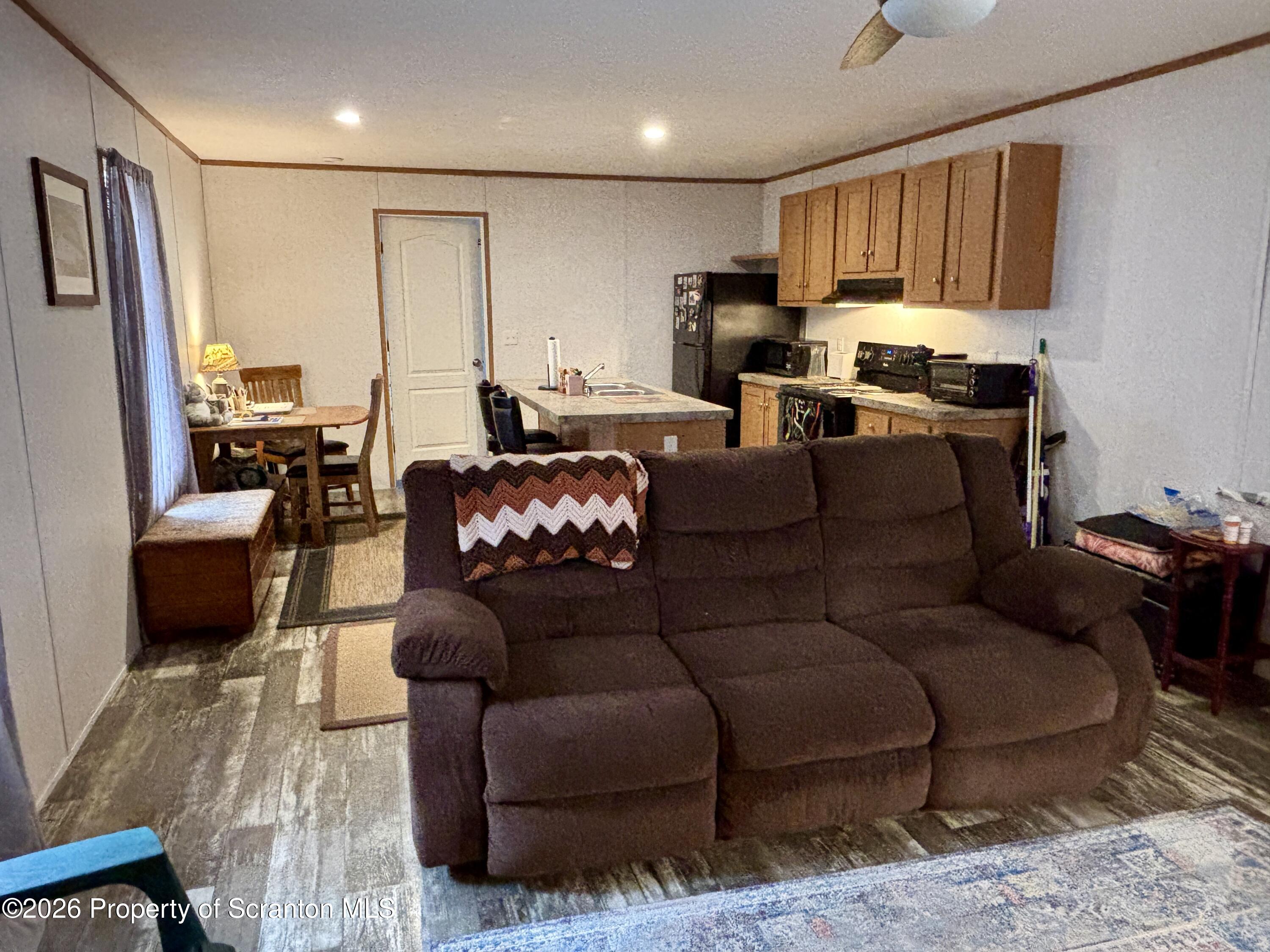 62 Timber Trail Factoryville, PA 18419 - Photo 19 of 23 a living room with furniture and a large window