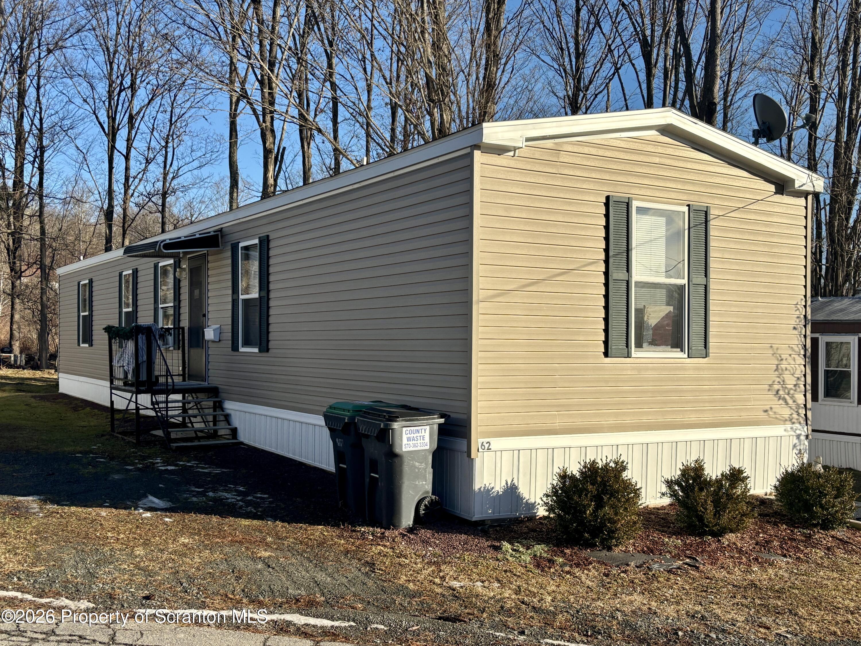 62 Timber Trail Factoryville, PA 18419 - Photo 2 of 23 a view of a house with a yard