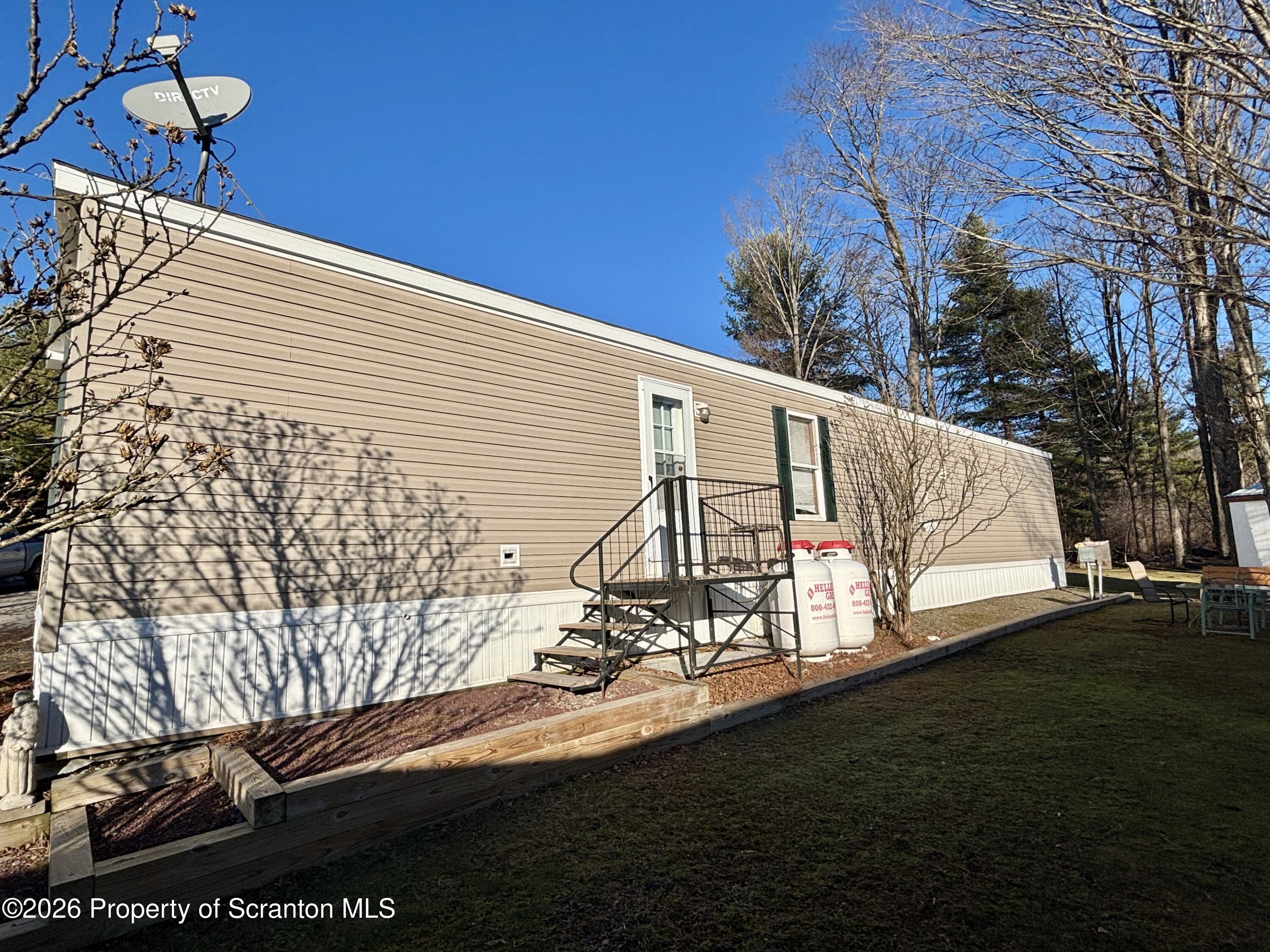 62 Timber Trail Factoryville, PA 18419 - Photo 4 of 23 a view of a balcony with yard