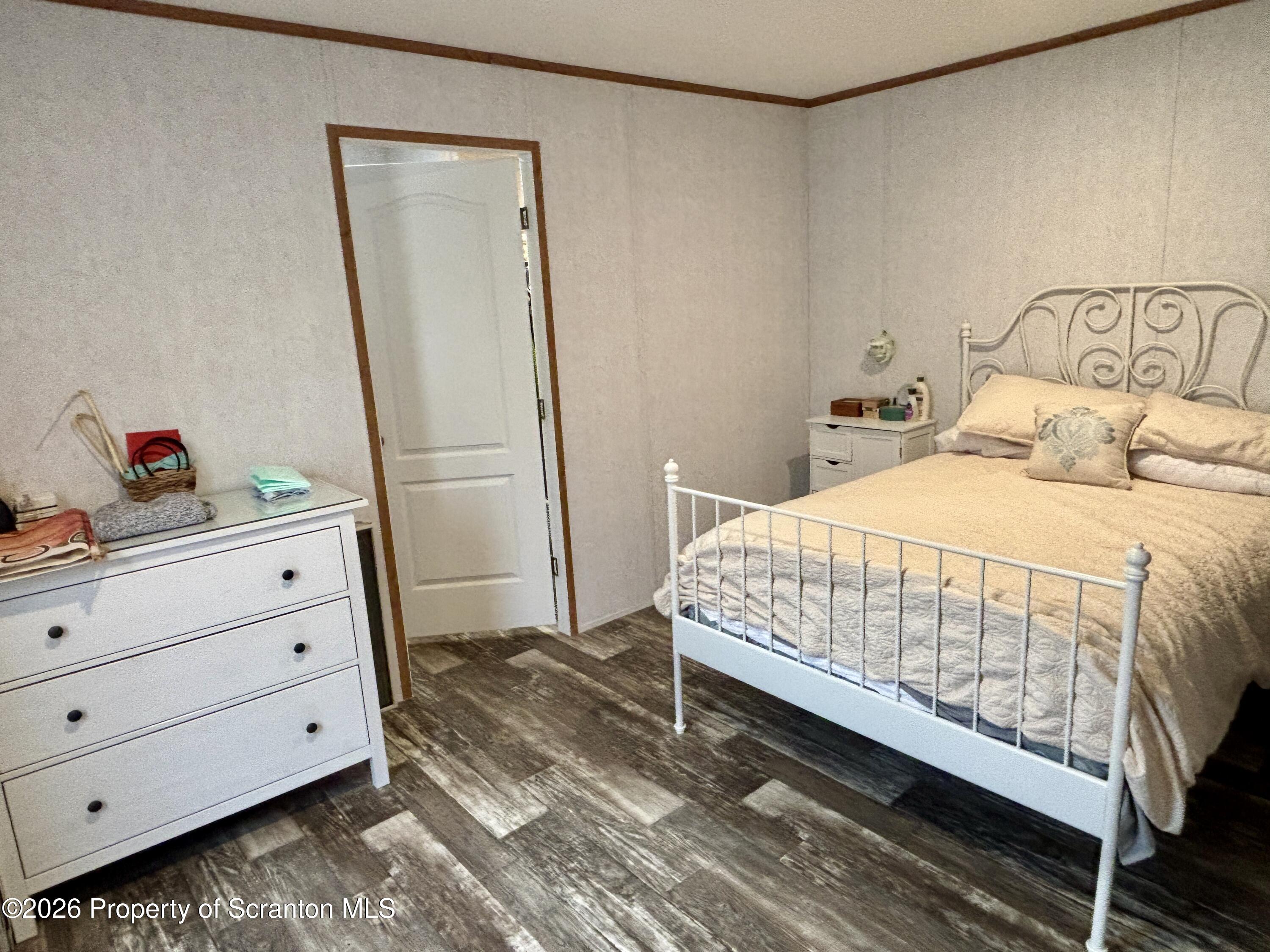 62 Timber Trail Factoryville, PA 18419 - Photo 8 of 23 a bedroom with a bed and a dresser