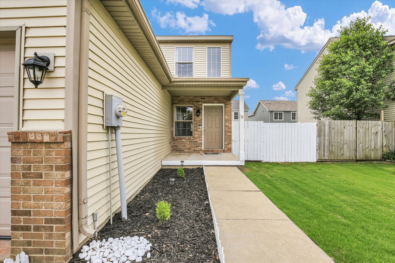 3715 Boulder Ridge Drive Champaign, IL 61822 - Photo 2 of 29 a view of a house with a yard