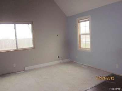 1392 Holmes Road Ypsilanti, MI 48198 - Photo 11 of 14 Master Bedroom