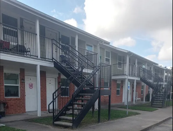 a view of a building with a bench
