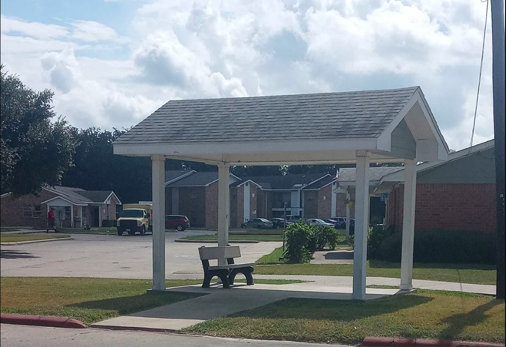 516 Laredo Street Navasota, TX 77868 - Photo 4 of 13 a view of a house with backyard and porch