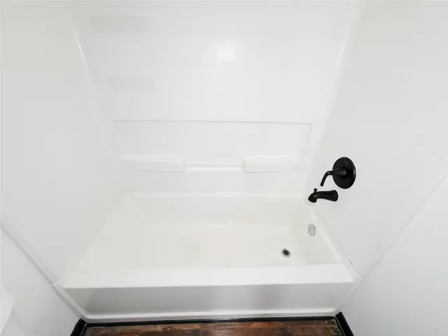 a bathroom with a bathtub