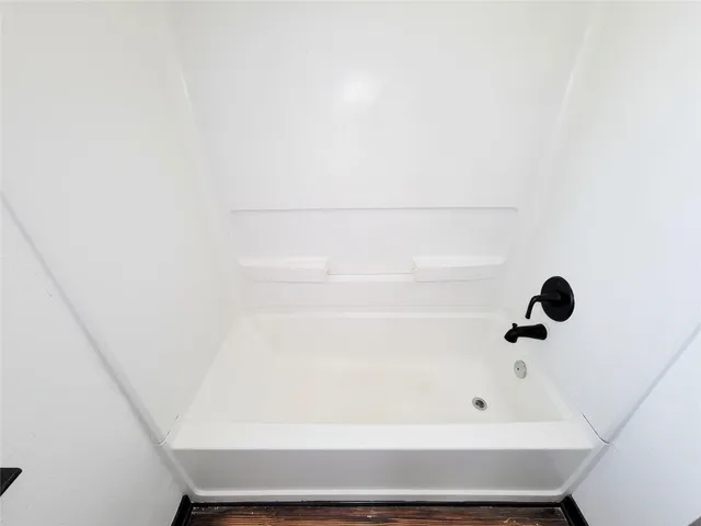 a bathroom with a bathtub