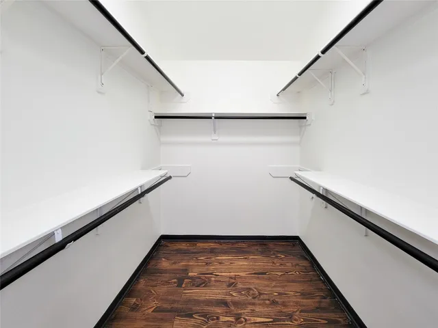 a view of a room with racks on the wall