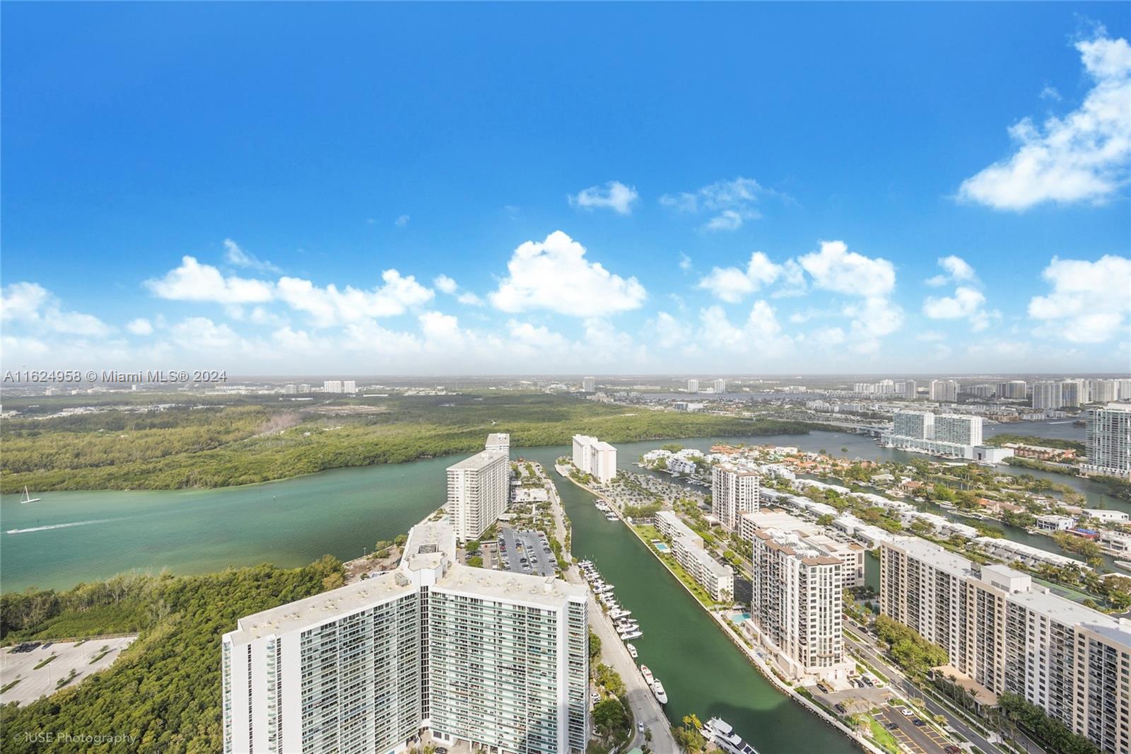 15701 Collins Avenue, Unit 4303 Sunny Isles Beach, FL 33160 - Photo 11 of 12 a view of a city and a lake view