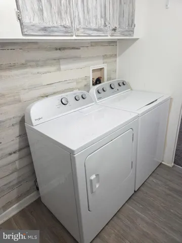 a view of an empty room and a window