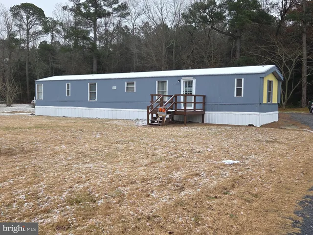 a view of a house with a big yard