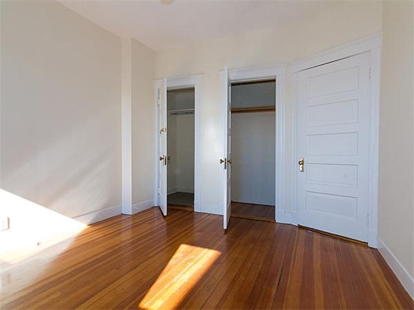 44 Orkney Road, Unit 5 Boston, MA 02135 - Photo 6 of 12 wooden floor in an empty room with a window