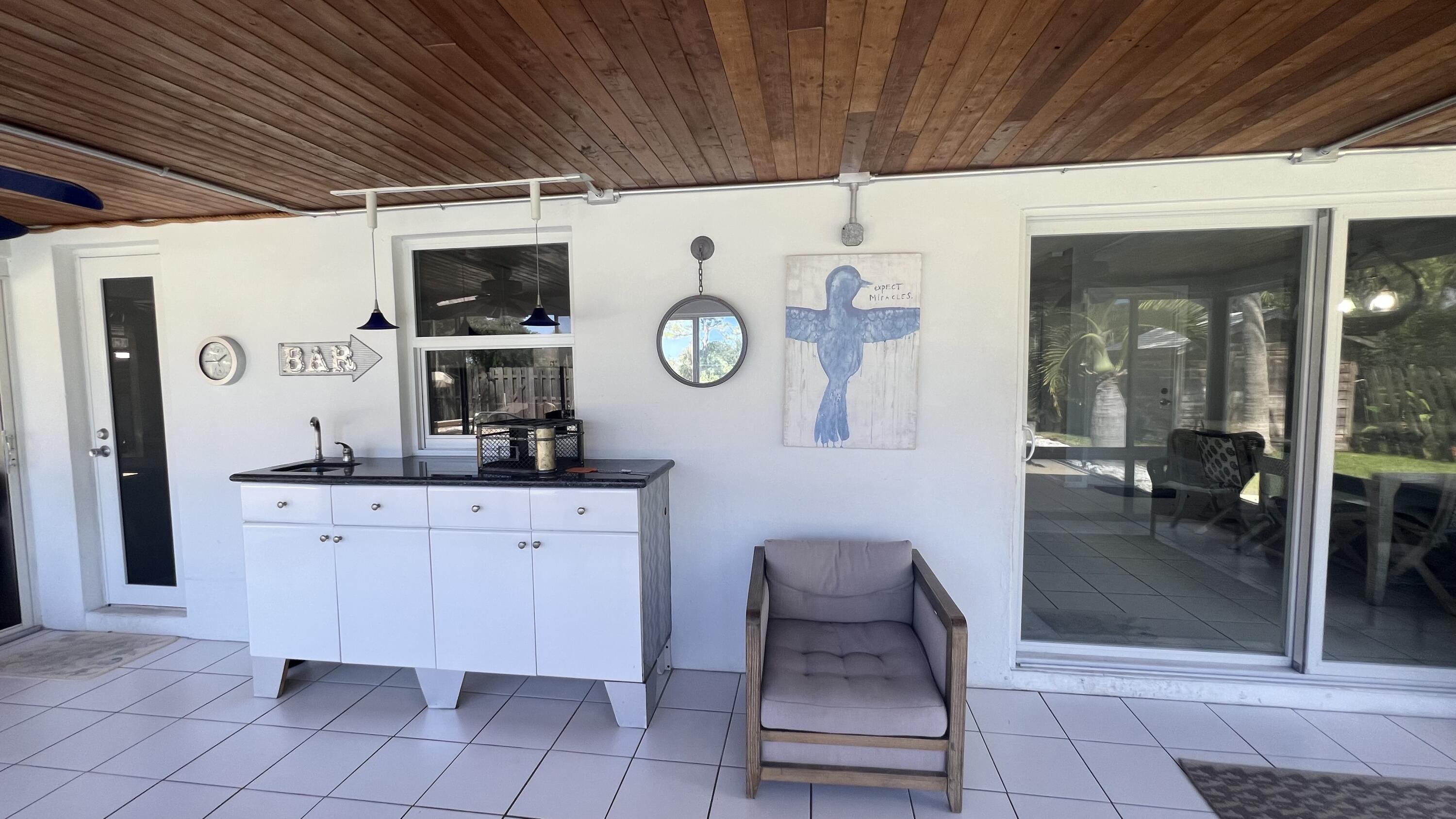 1224 Southwest 16th Avenue Boca Raton, FL 33486 - Photo 18 of 48 Screened Sunroom/Bar area