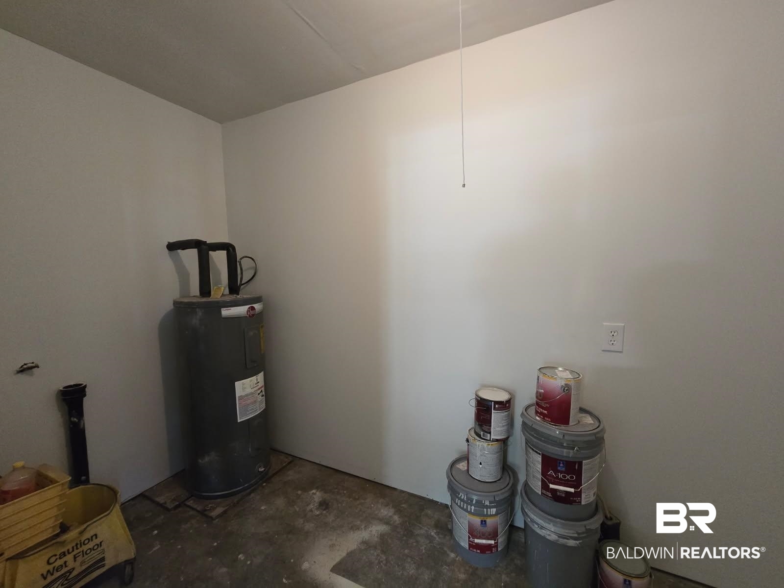 1404 Dailey Street Brewton, AL 36426 - Photo 23 of 25 Utility room featuring electric water heater