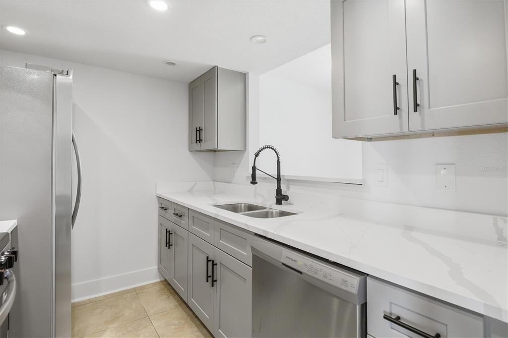 8911 Blind Pass Road, Unit 103 St. Pete Beach, FL 33706 - Photo 24 of 62