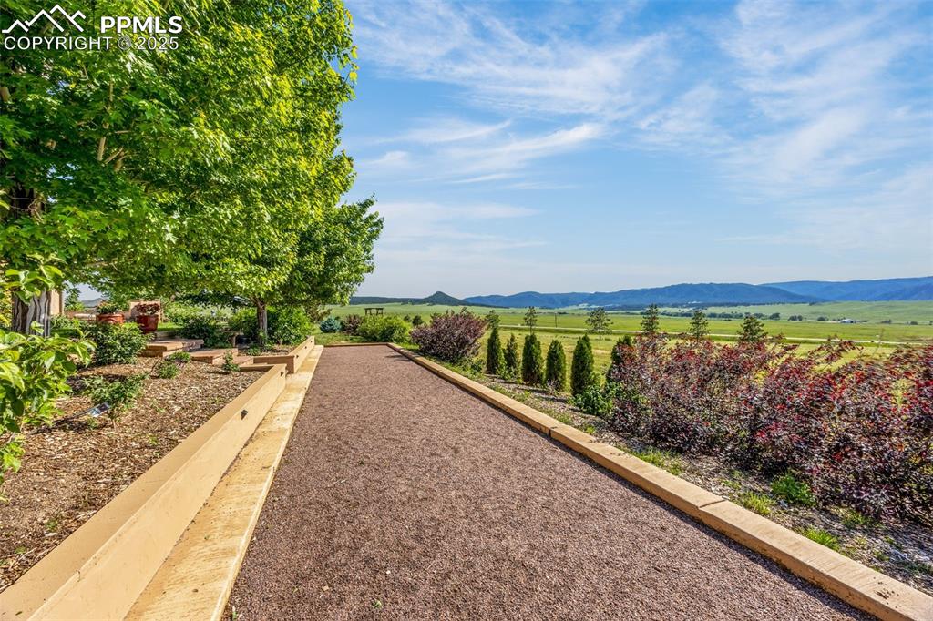 11784 Spruce Mountain Road Larkspur, CO 80118 - Photo 37 of 49 a view of swimming pool with a patio