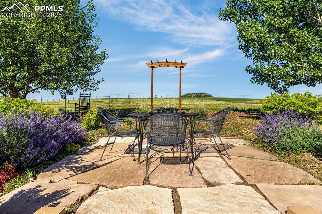 11784 Spruce Mountain Road Larkspur, CO 80118 - Photo 43 of 49 a view of an outdoor seating