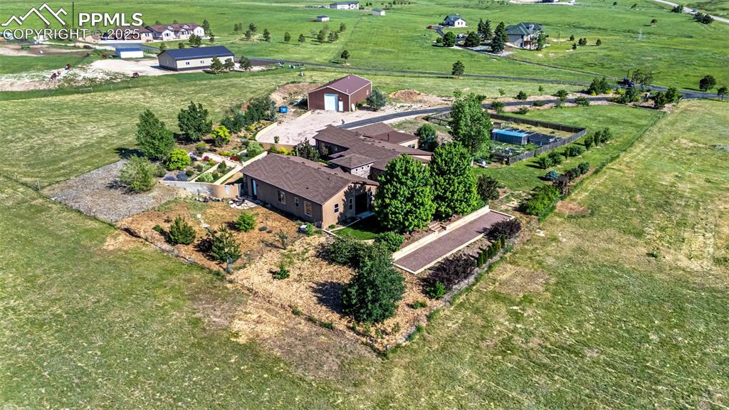 11784 Spruce Mountain Road Larkspur, CO 80118 - Photo 44 of 49 an aerial view of a house with outdoor space