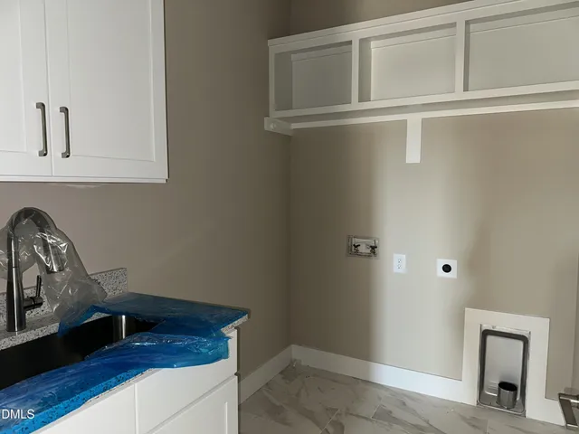 a view of a livingroom with wooden floor