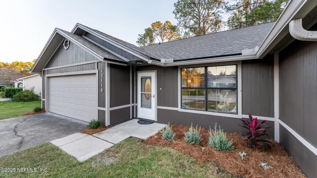 a house view with a backyard space
