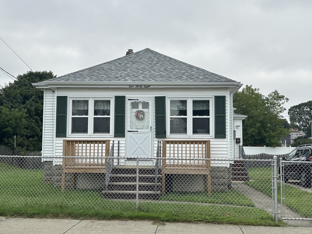 138 Anthony Street Fall River, MA 02721 - Photo 1 of 11 a front view of a house with a yard