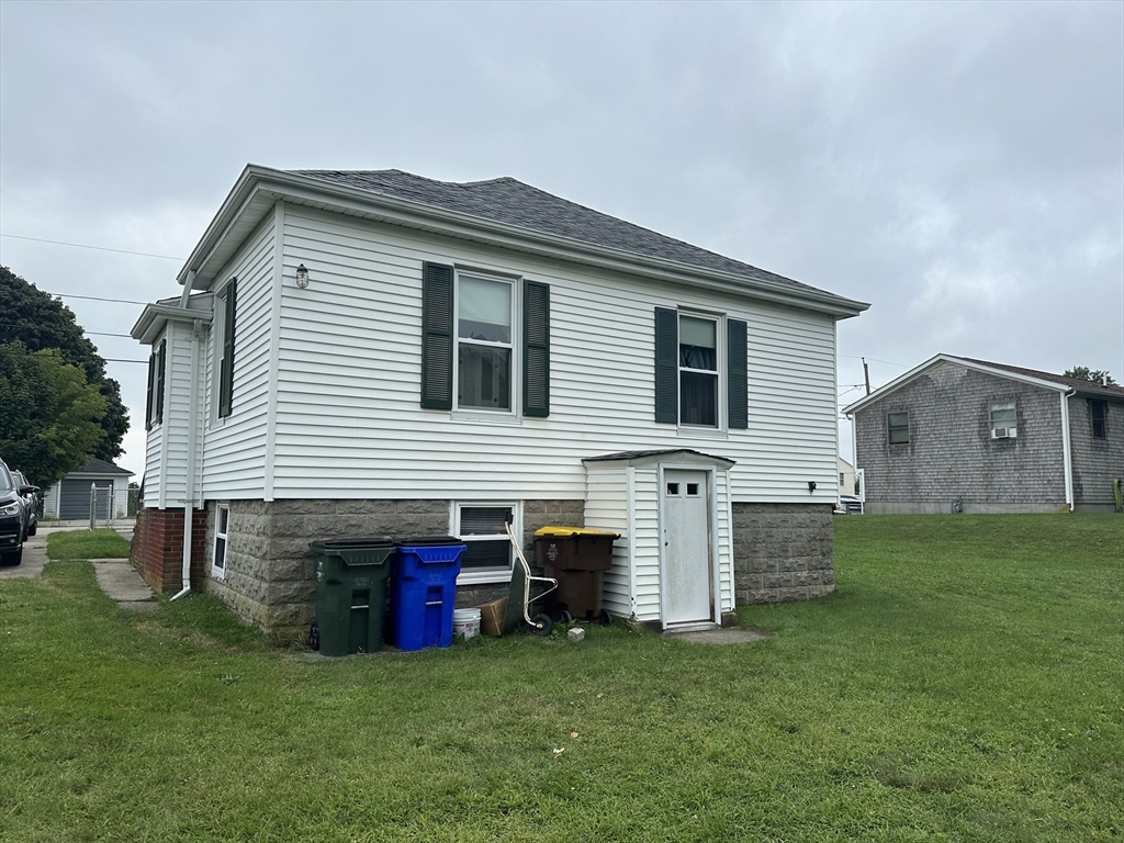 138 Anthony Street Fall River, MA 02721 - Photo 2 of 11 a view of a house with a yard