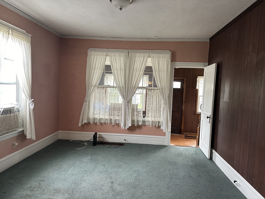 138 Anthony Street Fall River, MA 02721 - Photo 5 of 11 a view of room with window and air conditioner