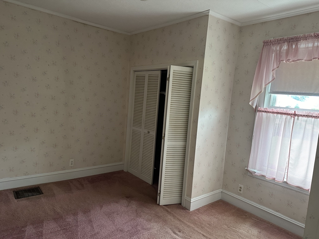 138 Anthony Street Fall River, MA 02721 - Photo 7 of 11 an empty room with windows