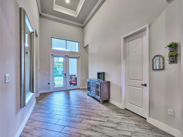 a kitchen with stainless steel appliances kitchen island granite countertop a stove and cabinets