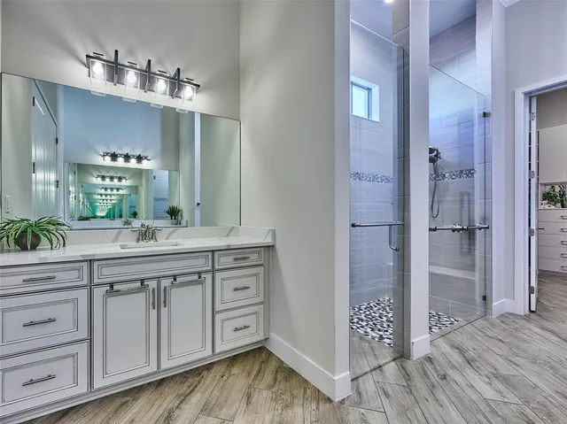 a bathroom with a sink a toilet and a bathtub