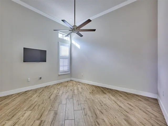aerial view of a house with a yard