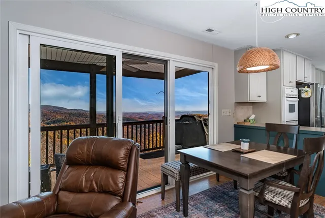 a kitchen with stainless steel appliances a stove refrigerator sink and microwave