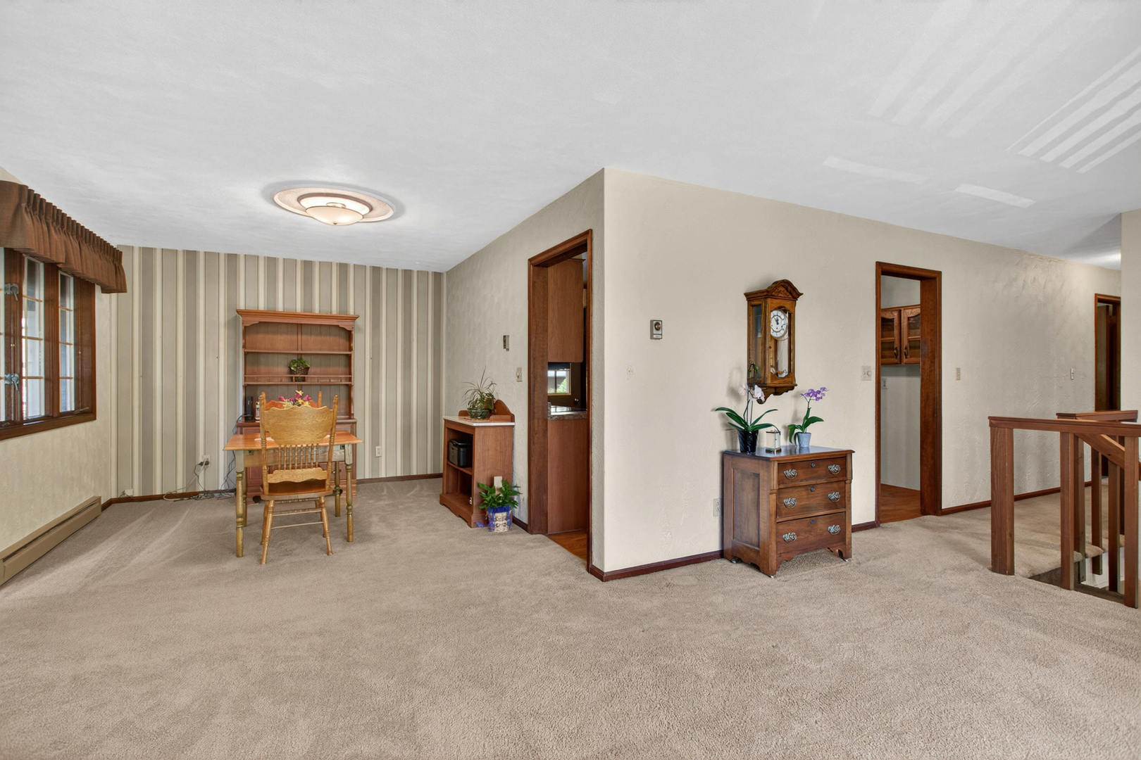 2660 252nd Street De Witt, IA 52742 - Photo 22 of 45 a living room with furniture and a window