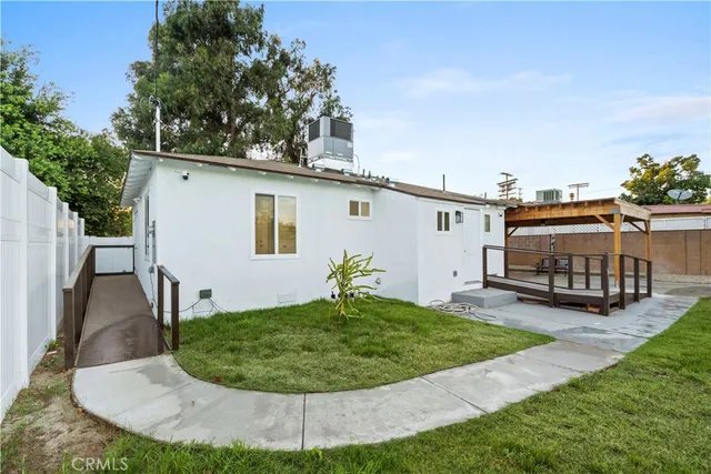 swimming pool view with a garden space