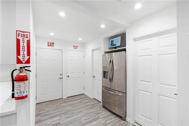 a white refrigerator freezer sitting inside of a kitchen