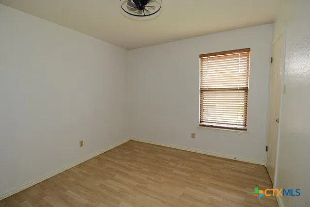 a view of a livingroom with a window
