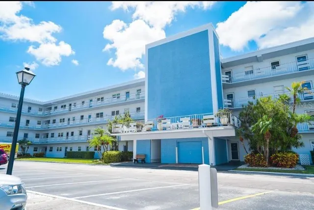 a view of a lake with a garden