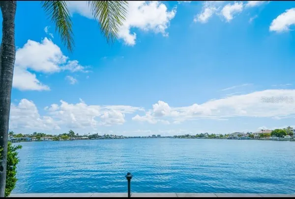 a view of a street with cars