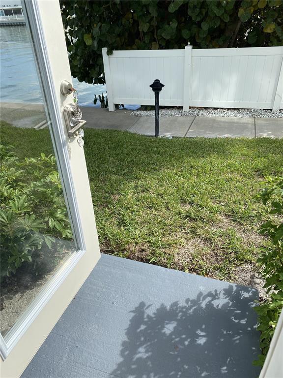 5555 Gulf Boulevard, Unit 104 St. Pete Beach, FL 33706 - Photo 33 of 35 a view of a back yard