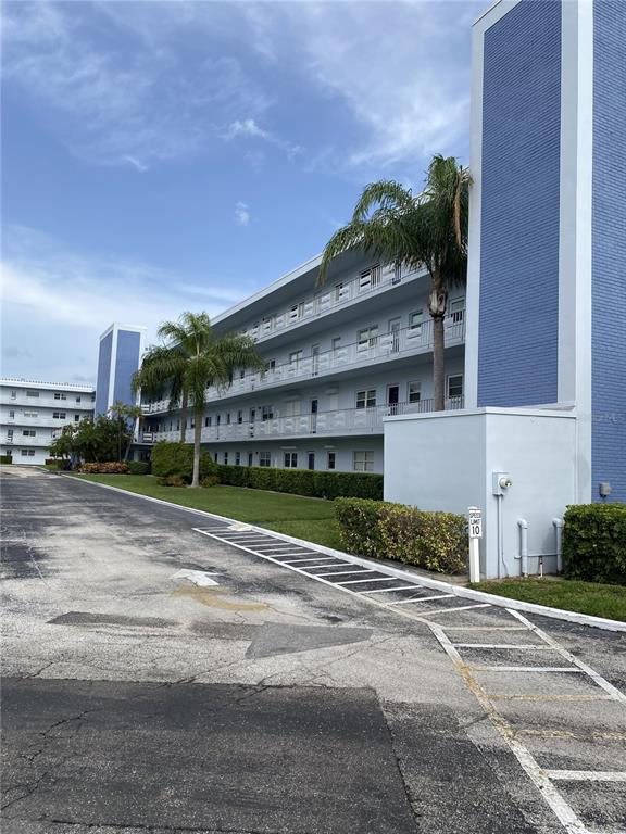5555 Gulf Boulevard, Unit 104 St. Pete Beach, FL 33706 - Photo 34 of 35 a view of a building with a street