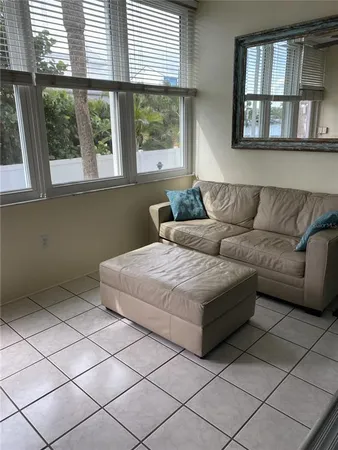 a bedroom with a bed and cabinets