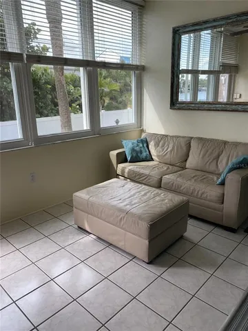 a bedroom with a bed and cabinets