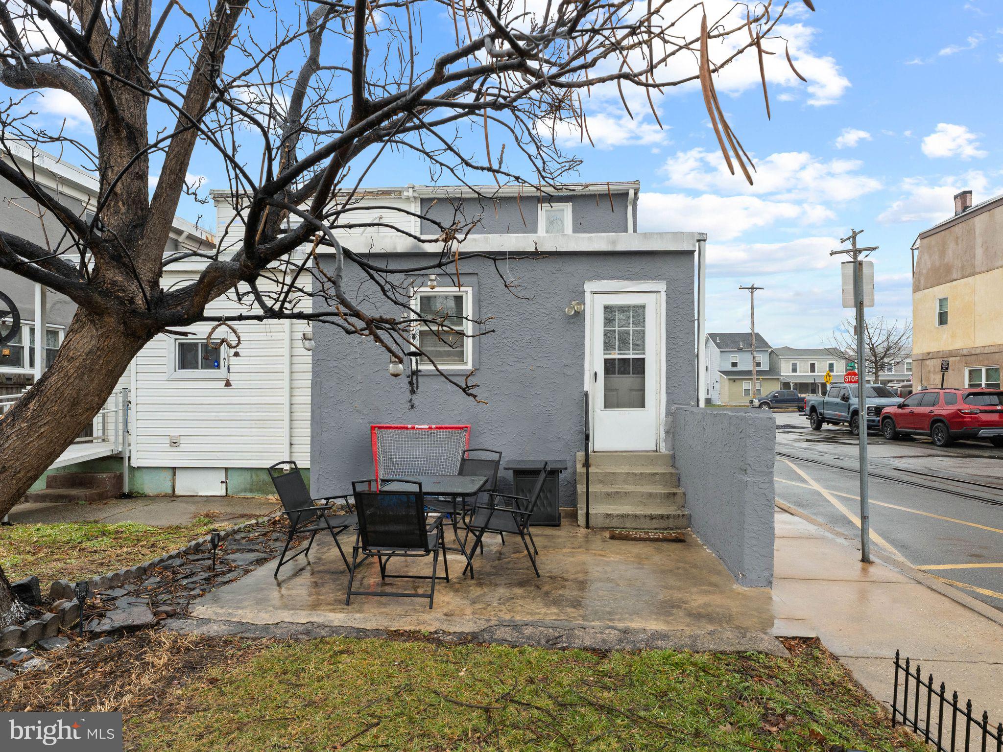 400 Market Street Marcus Hook, PA 19061 - Photo 11 of 25 a view of a dinning table and chairs in the patio