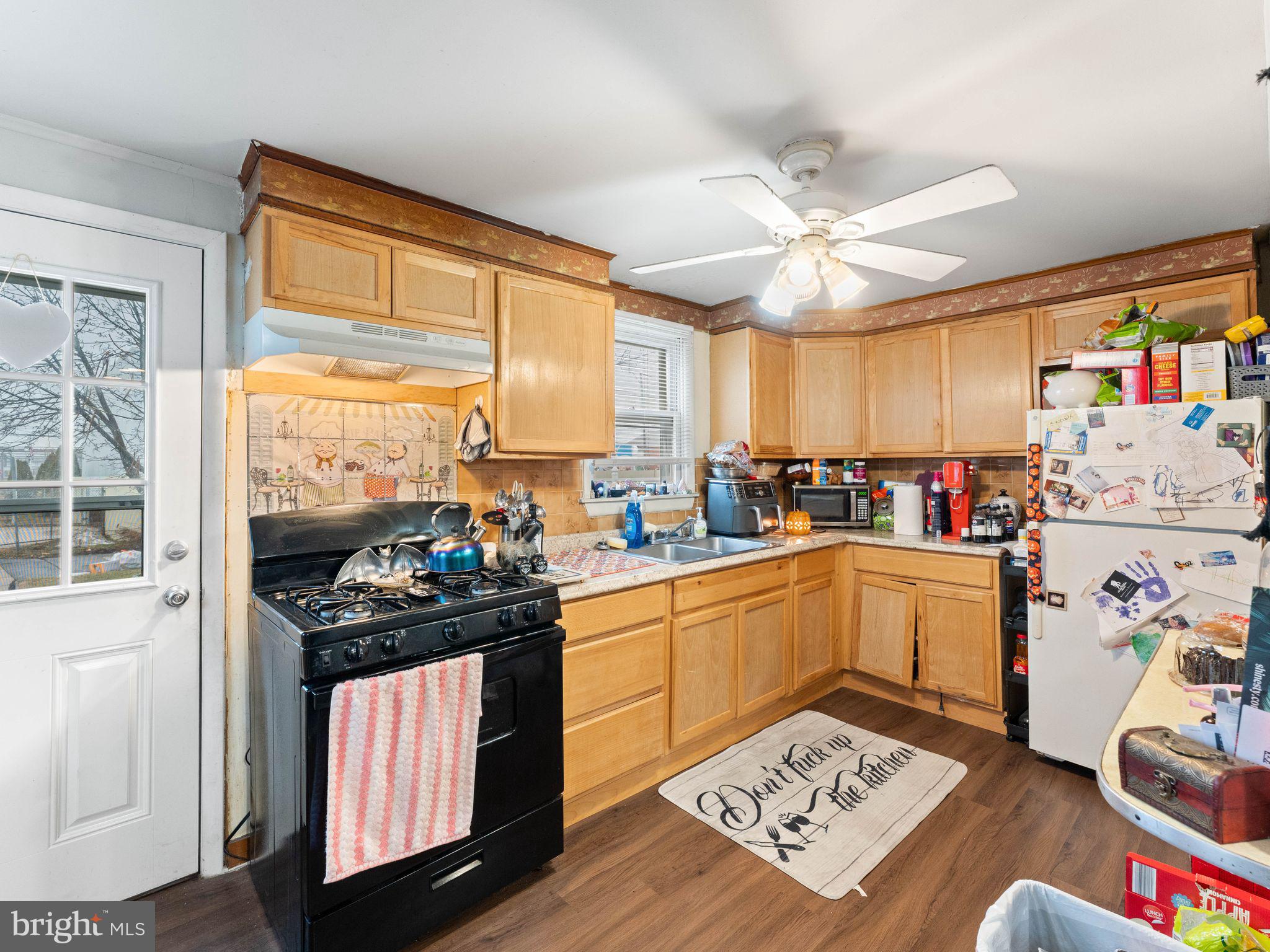 400 Market Street Marcus Hook, PA 19061 - Photo 14 of 25 a kitchen with stainless steel appliances a stove a sink and a refrigerator